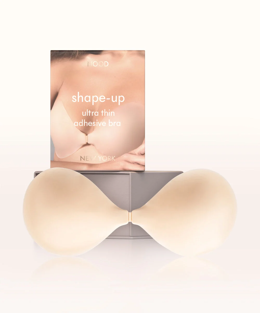 Official NOOD Shape Up Adhesive Bra photograph with matte silicone cups, a center clasp and branded packaging.