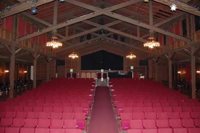 Berkeley Playhouse theatre interior with red seats and wooden trusses