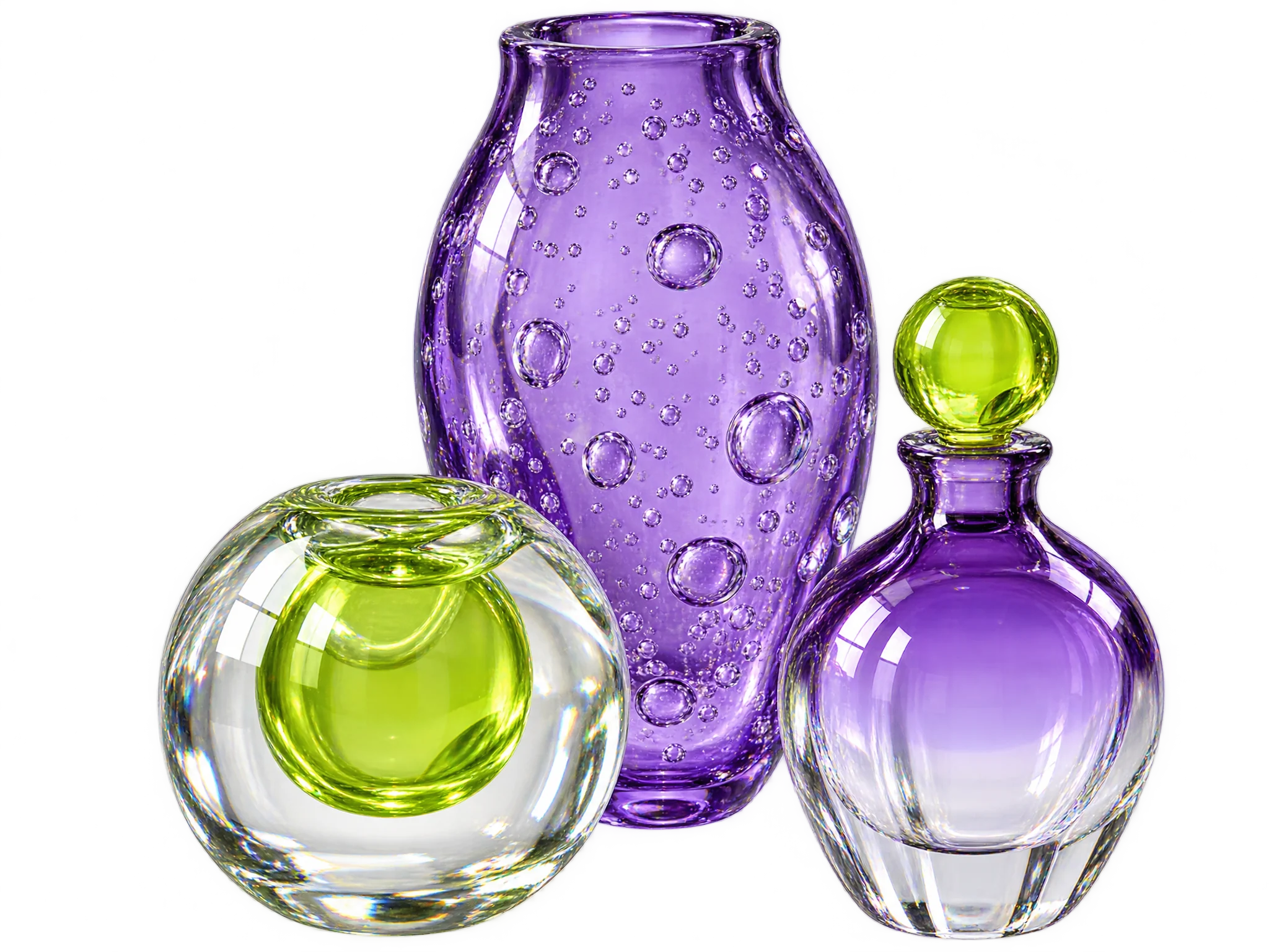Three Pellori art glass objects: a violet bubble vase, a clear orb with a lime core and a violet bottle with a lime stopper