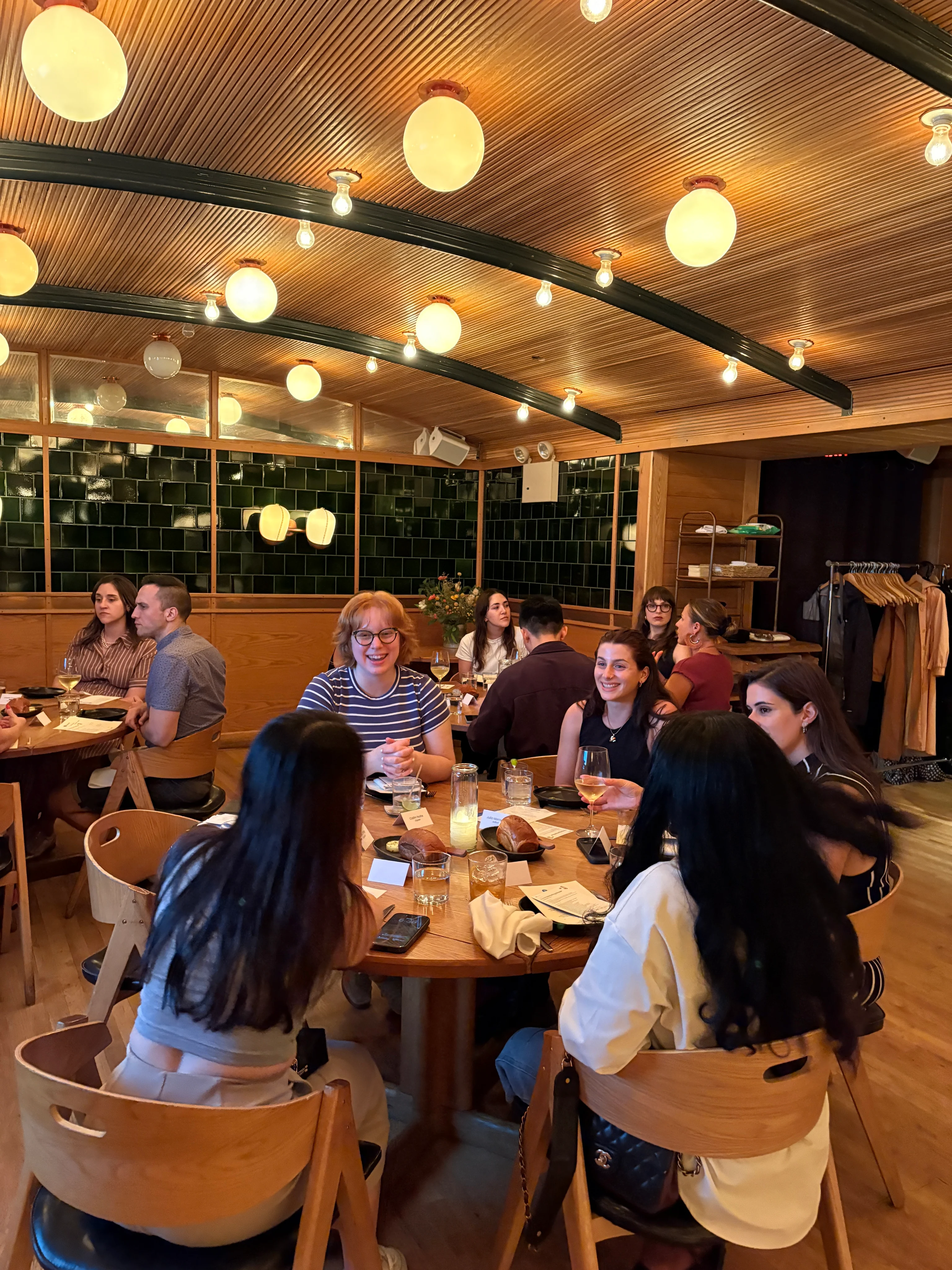 Event guests connecting over dinner