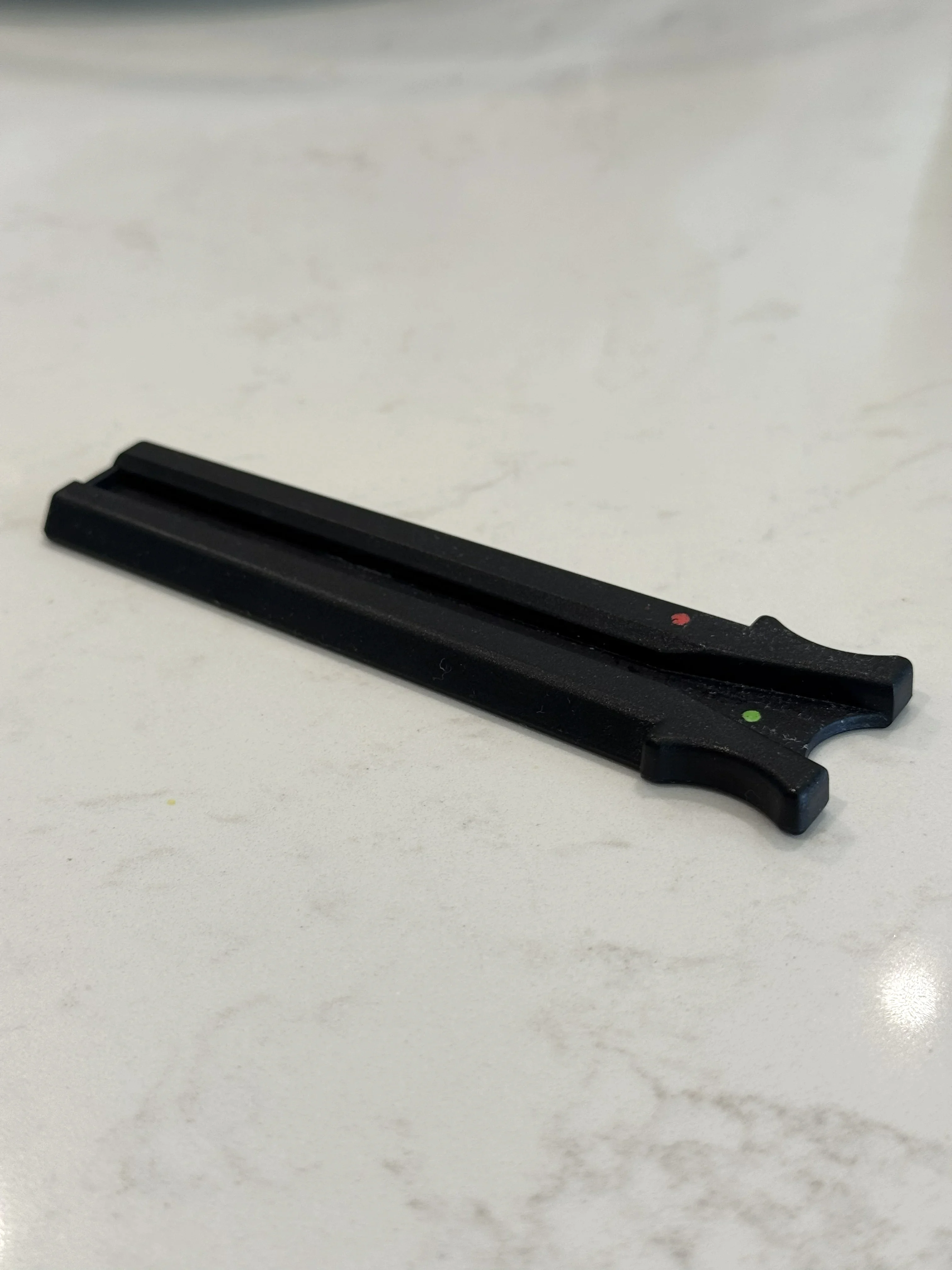 Full-width view of the black BodyCheck loading tray on a light countertop