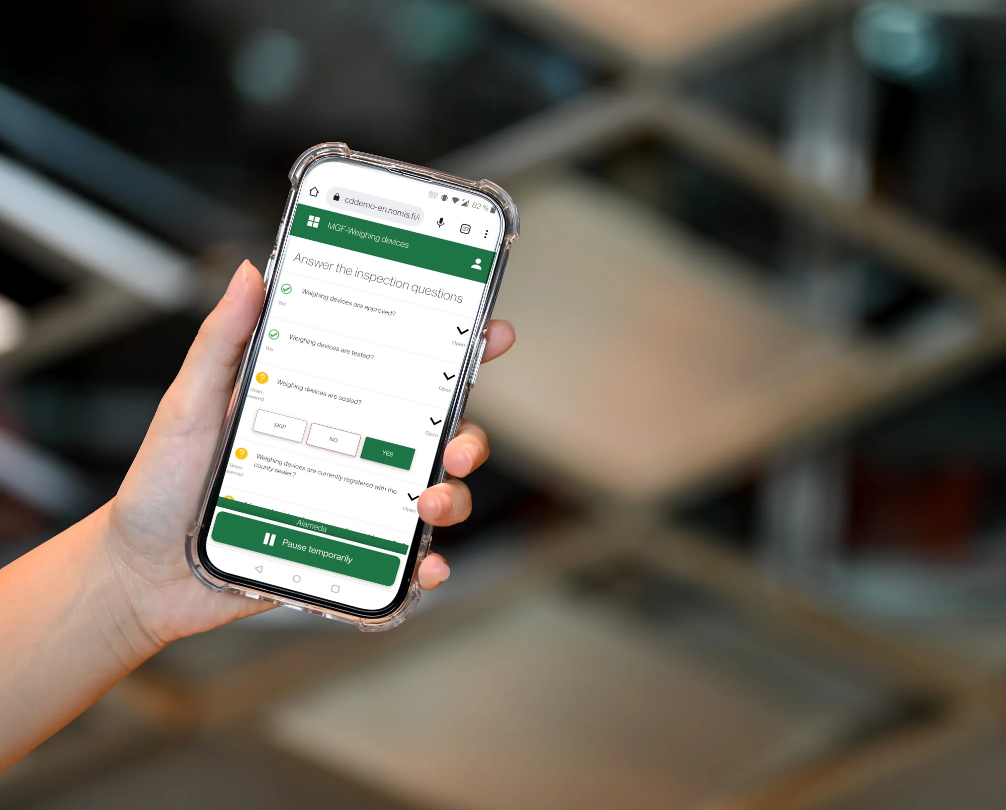 Nomis QualityDesk inspection questions on a mobile phone