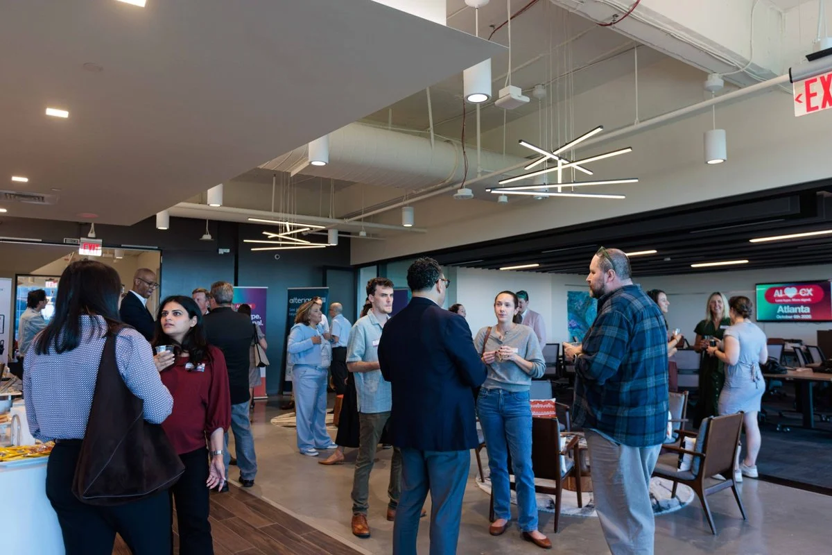 Guests mingle across the venue before the AI ❤️ CX Atlanta panel