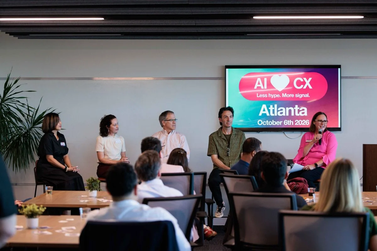 Four panelists and the moderator speak to a seated audience at AI ❤️ CX Atlanta