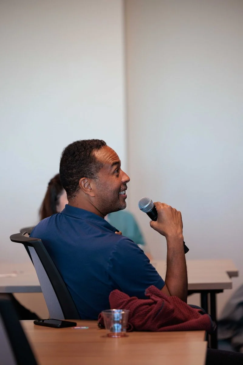 An attendee asks the panel a question at AI ❤️ CX Atlanta