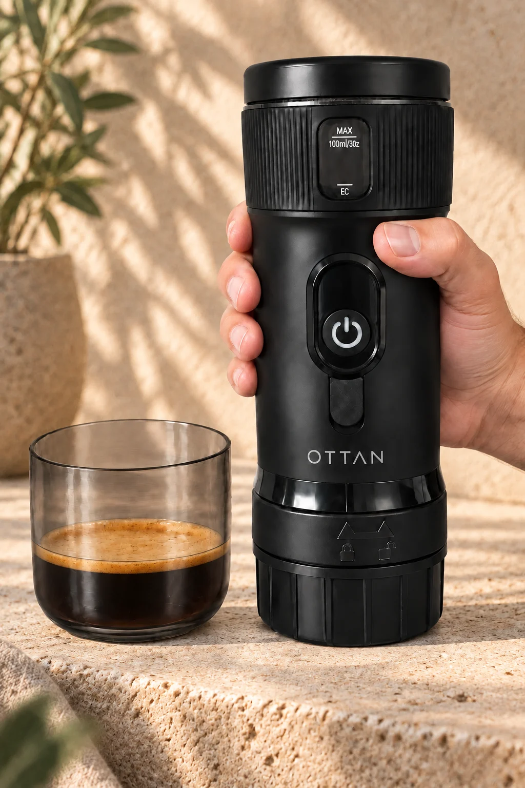 OTTAN Nord beside a glass of freshly brewed espresso