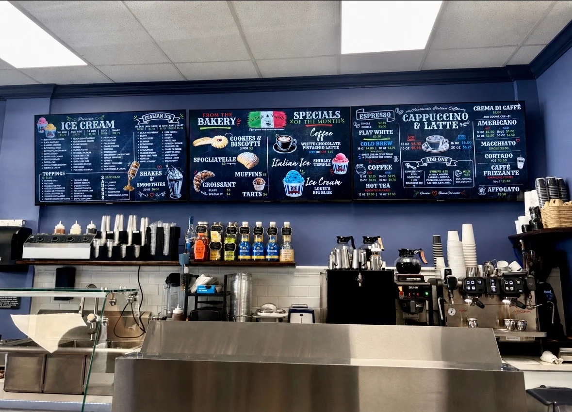 Café di Napoli ice cream, bakery, and coffee menu boards