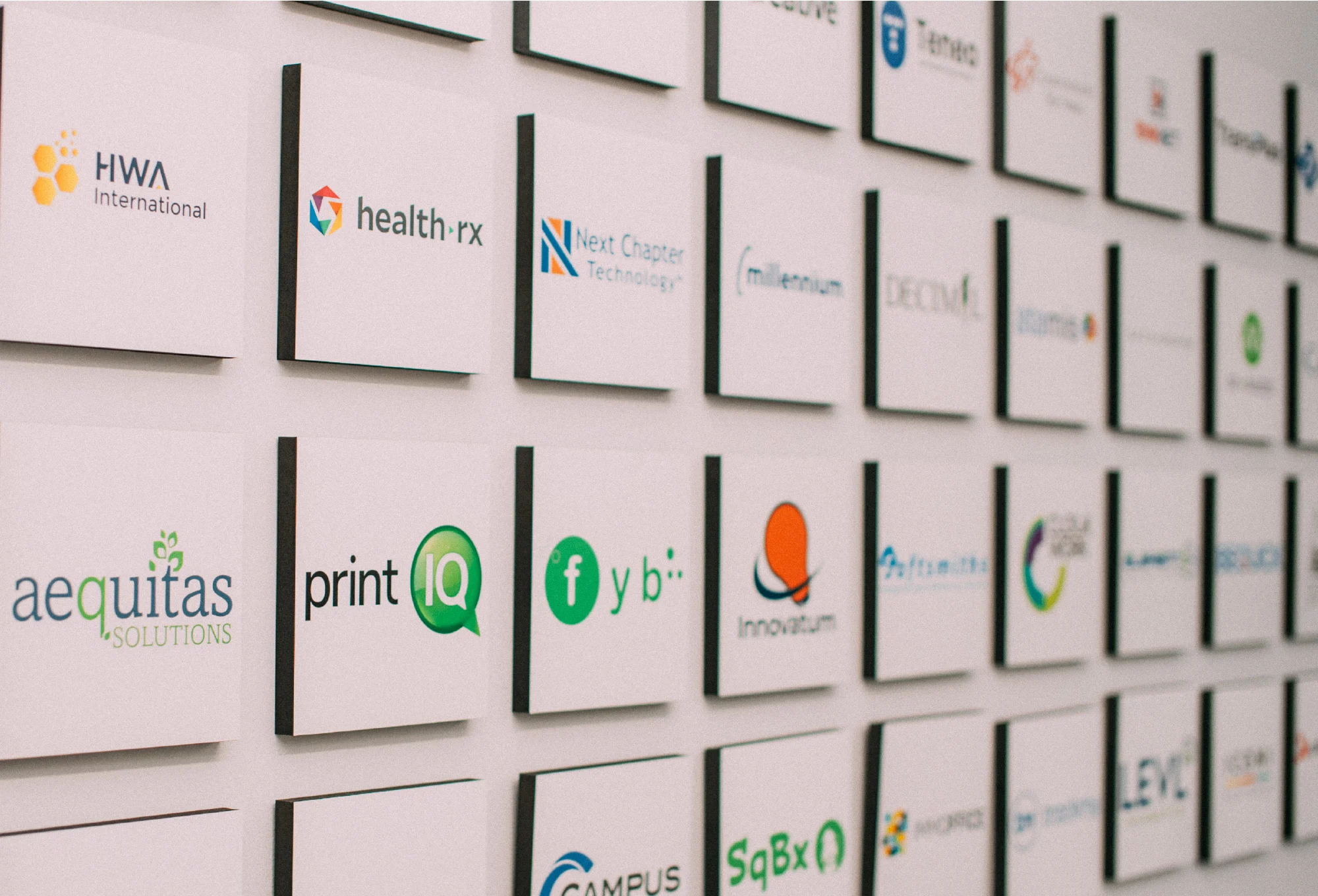 Wall displaying Banyan Software portfolio company logos