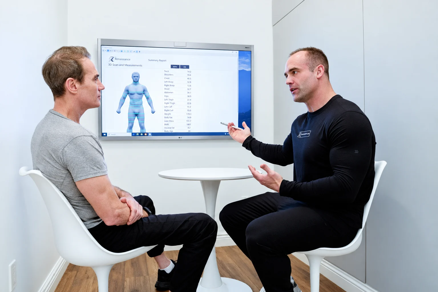 NYC Performance Lab specialist reviewing body composition results with a client