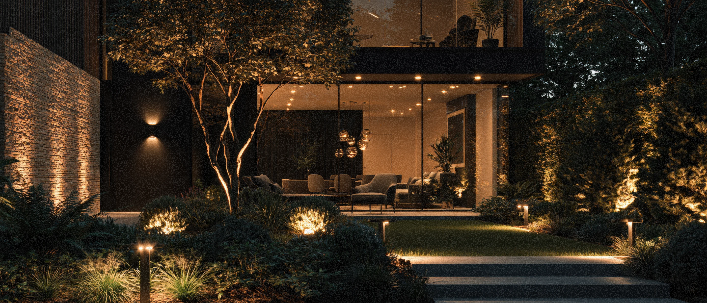 Modern residential garden illuminated at night