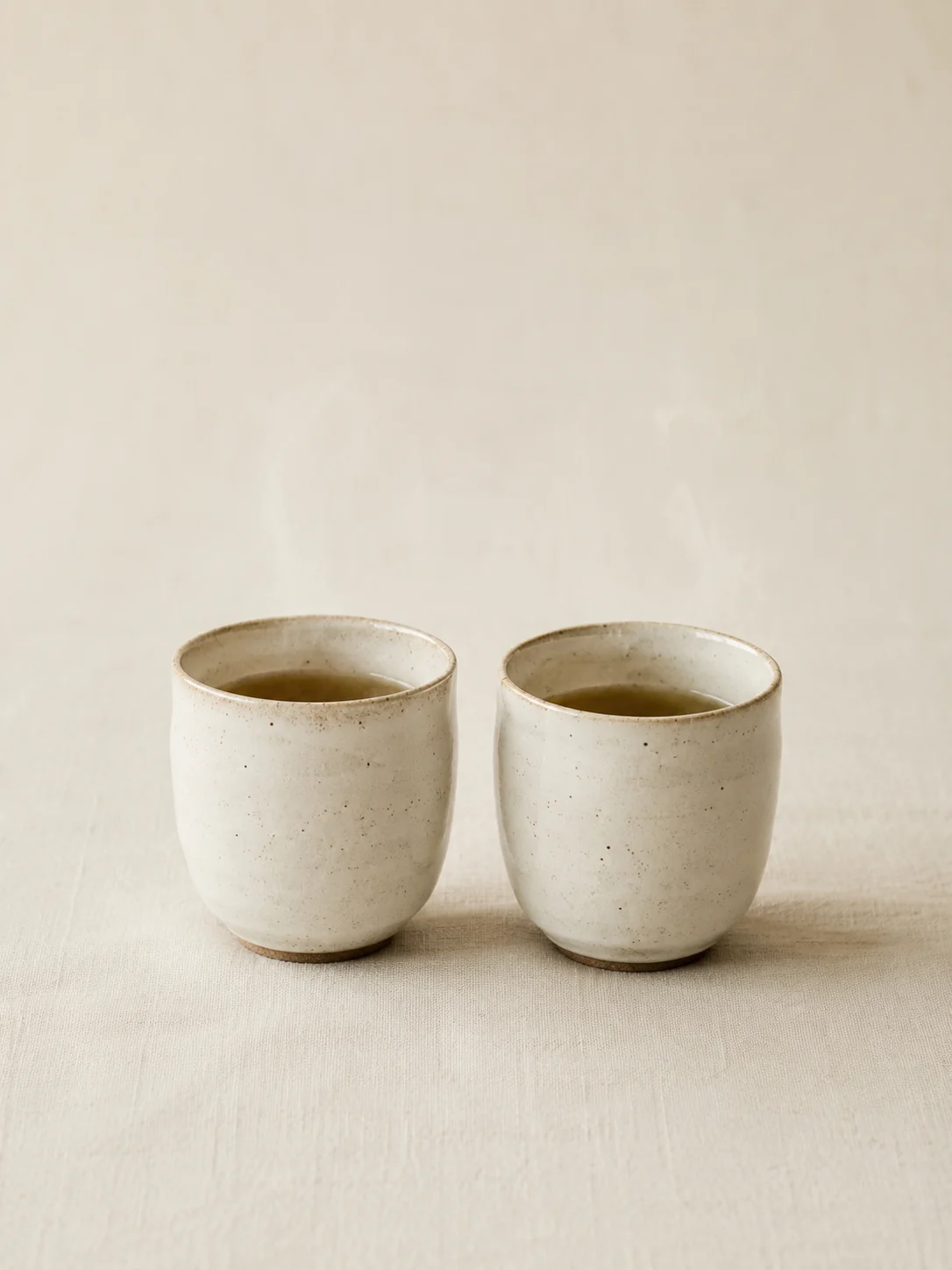 Two ceramic cups, the CEO Conversation visual object