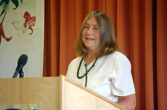Elaine Storkey speaking at a lectern
