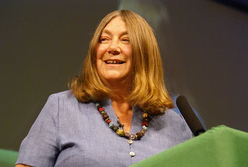 Elaine Storkey speaking at a lectern