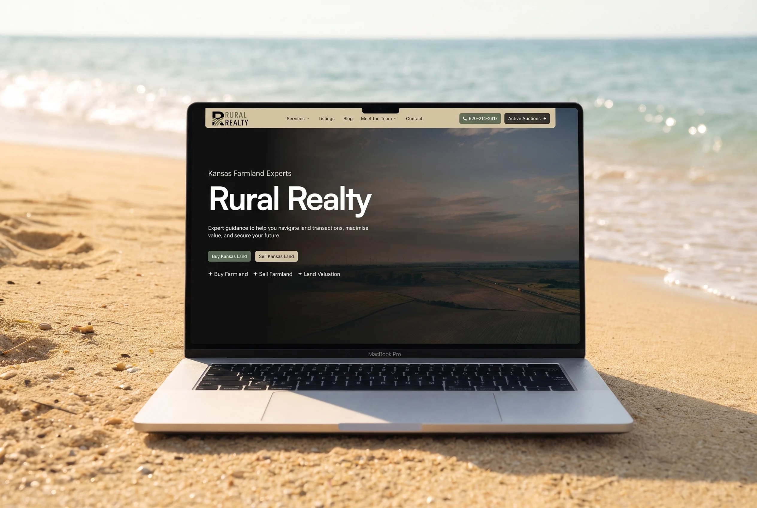 Rural Realty Co. website displayed on a laptop