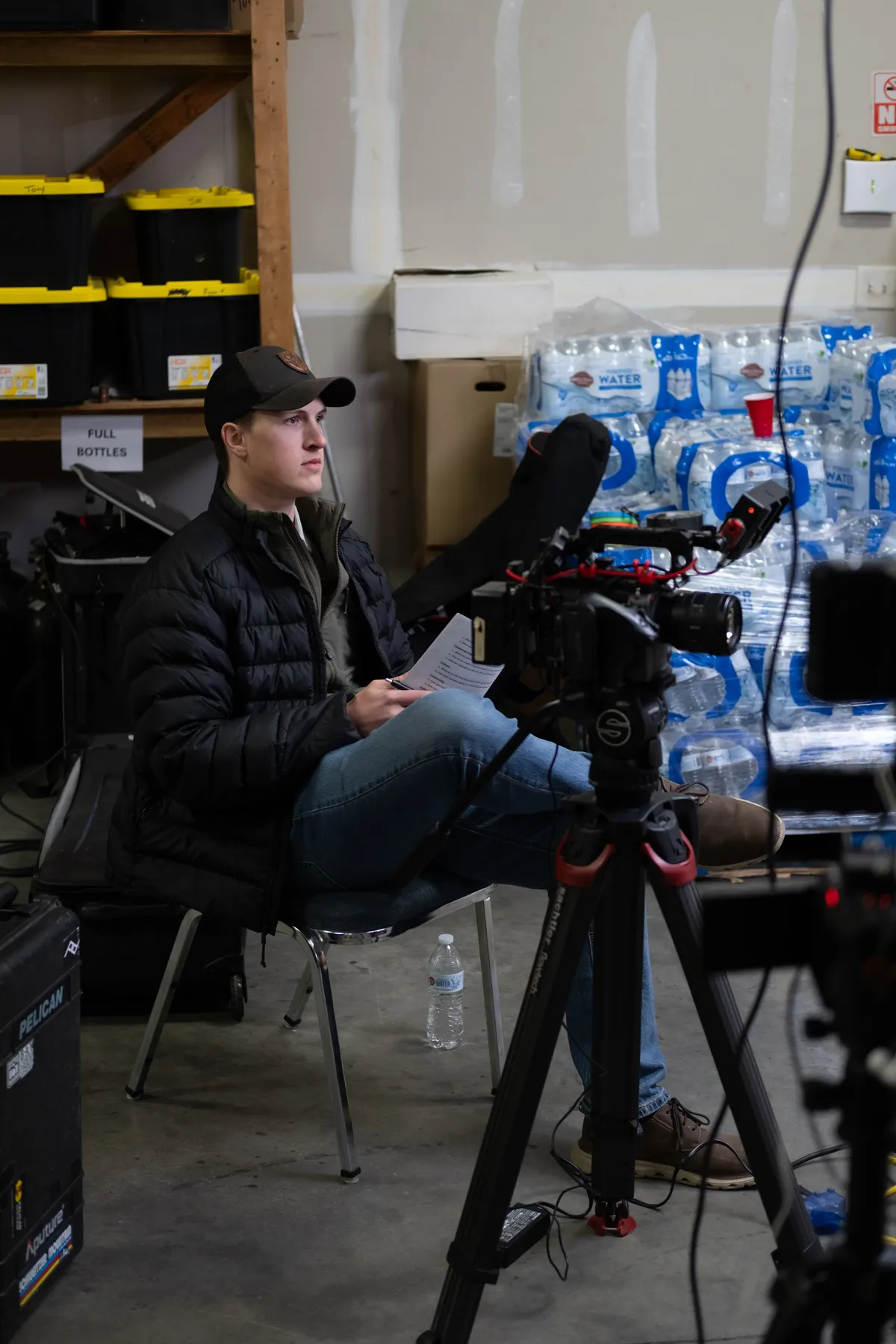 Chantz Yager beside the camera on a video shoot
