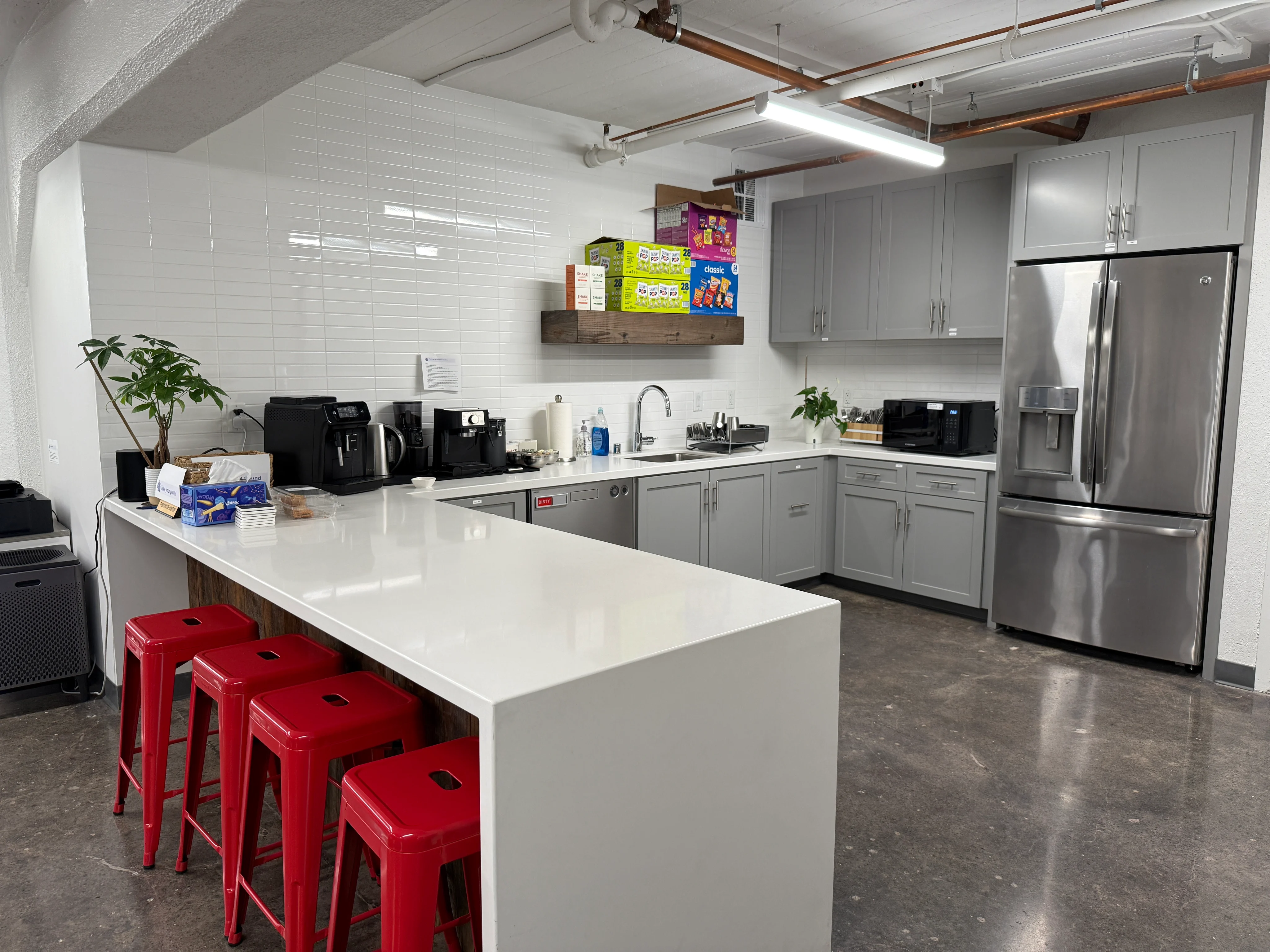 A fully stocked kitchen and lounge for coffee breaks.