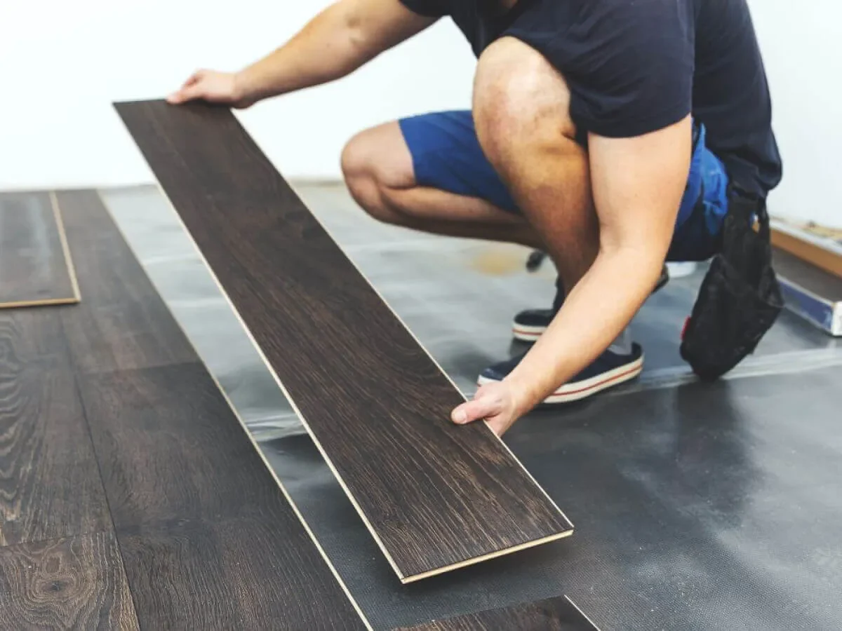 Flooring Installer setting up a floor for BauBau