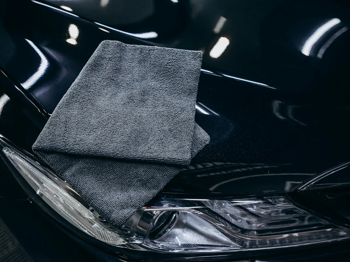 Folded gray microfiber cleaning cloth