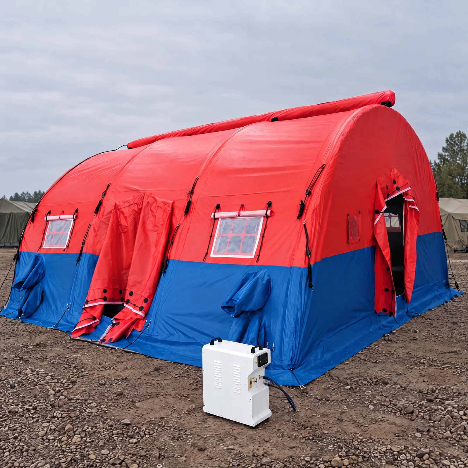 Red and blue high-pressure inflatable tent with side windows, covered openings and an open entrance outdoors