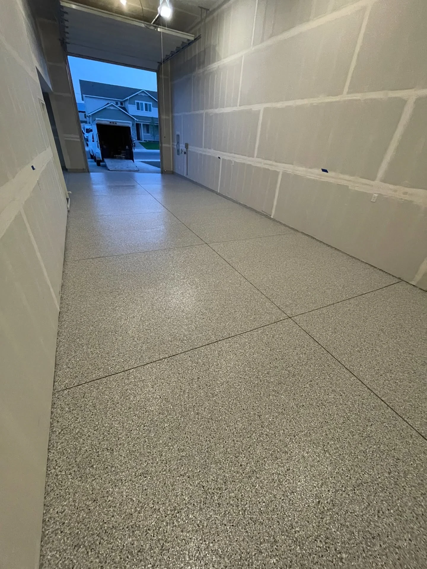 Decorative flake floor in a long garage