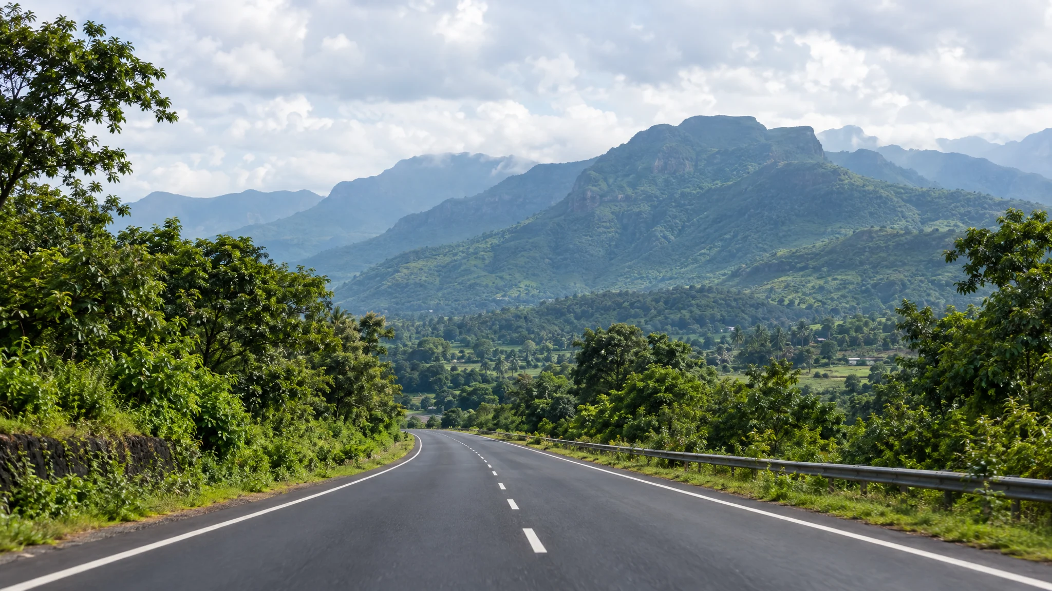 Illustrative road through green Maharashtra hills