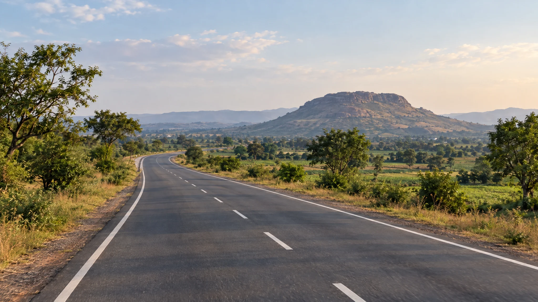 Illustrative road through Maharashtra countryside