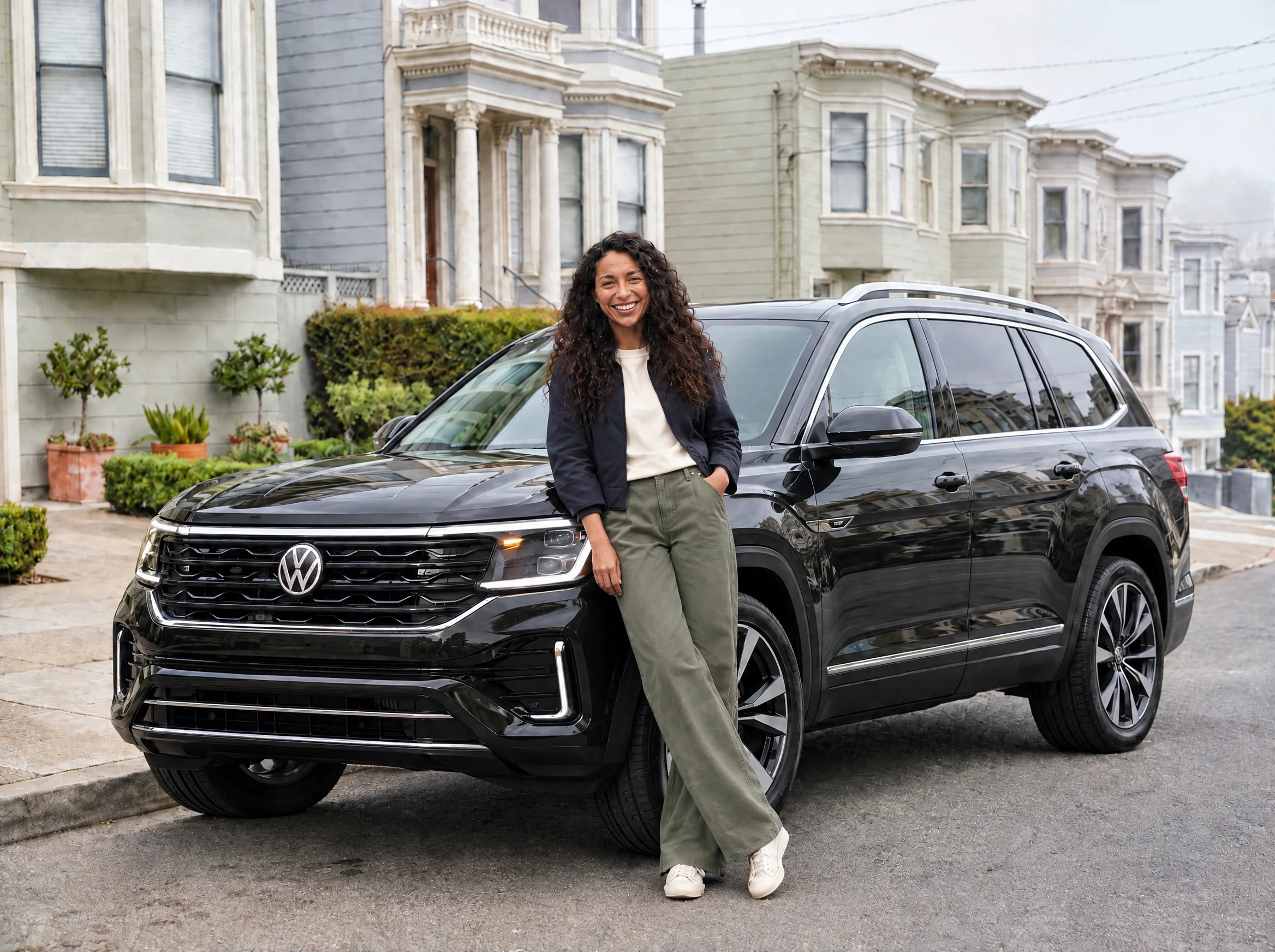 8Fleet driver beside a black Volkswagen Atlas in San Francisco