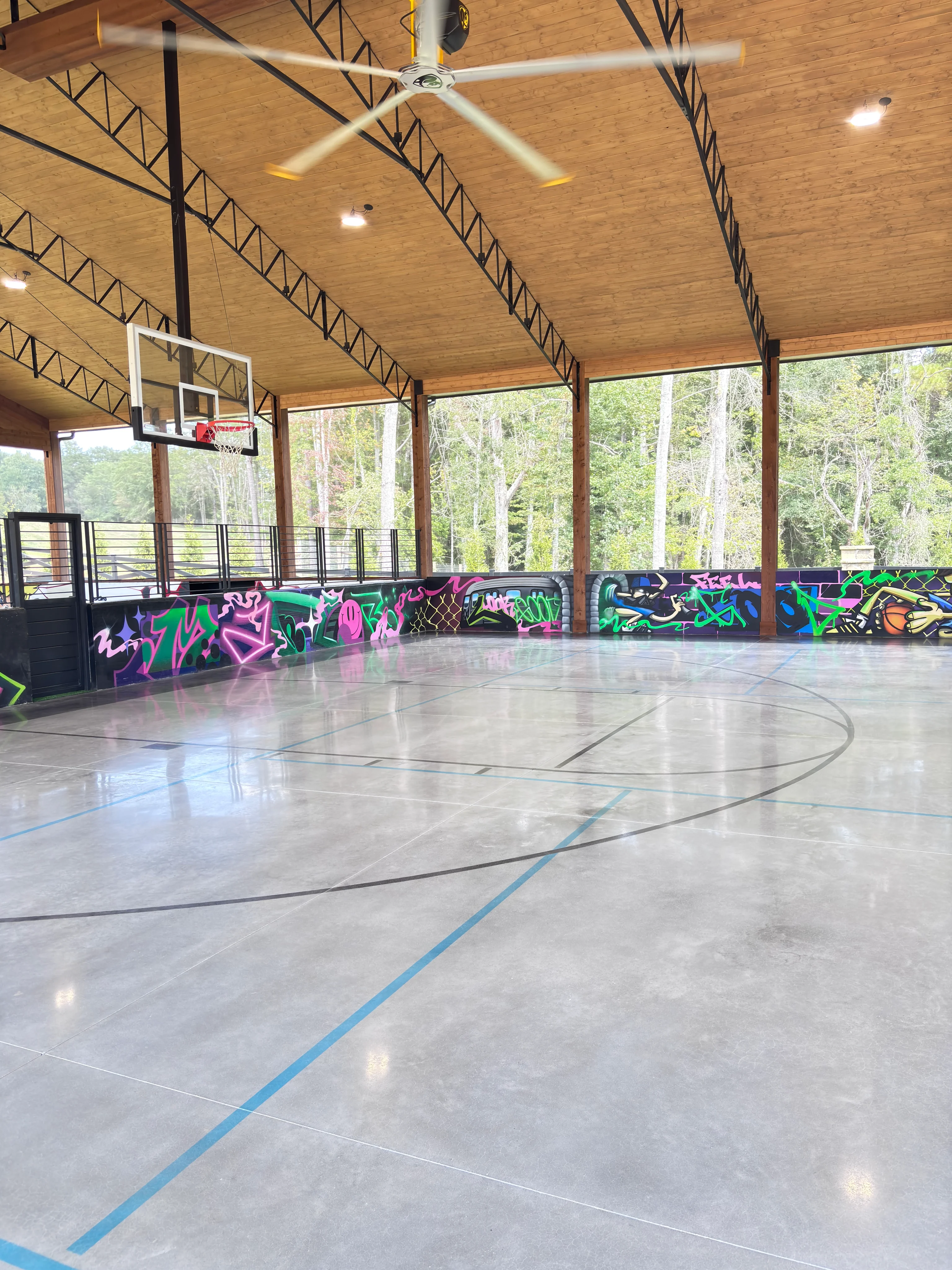 Polished concrete floor in an indoor basketball court