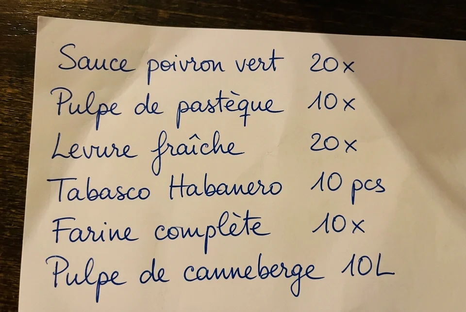 Commande de restaurant manuscrite envoyée par WhatsApp