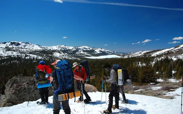 Snowshoers facing Caples Lake near Kirkwood
