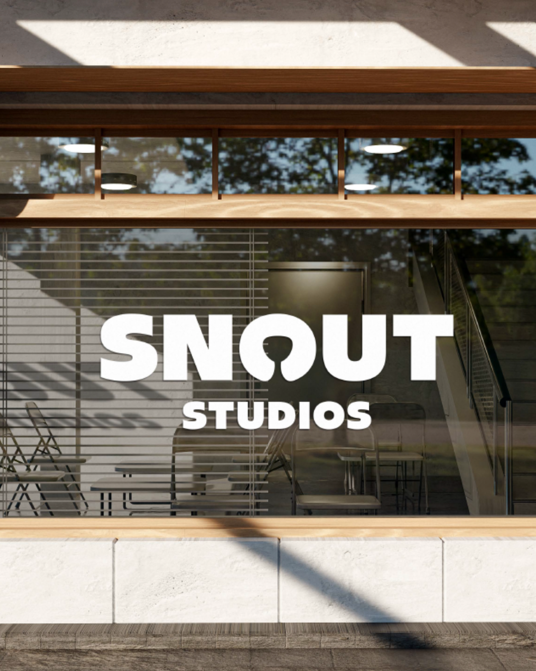 A modern Snout Studios glass storefront — the kind of destination tenant your retail space could become