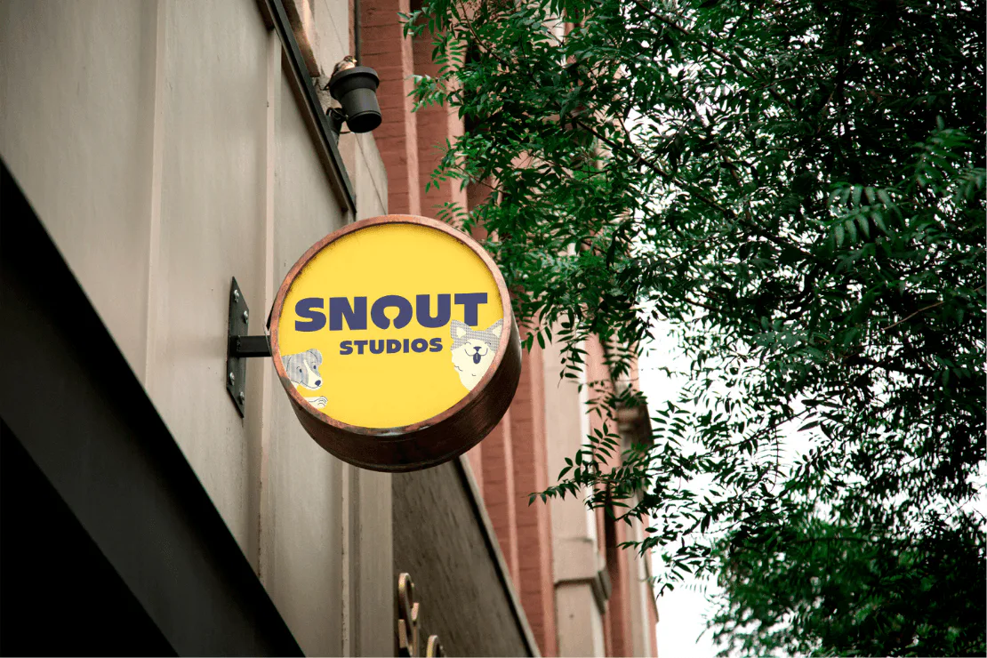 The yellow Snout Studios sign outside the Echo Park location on W Temple Street