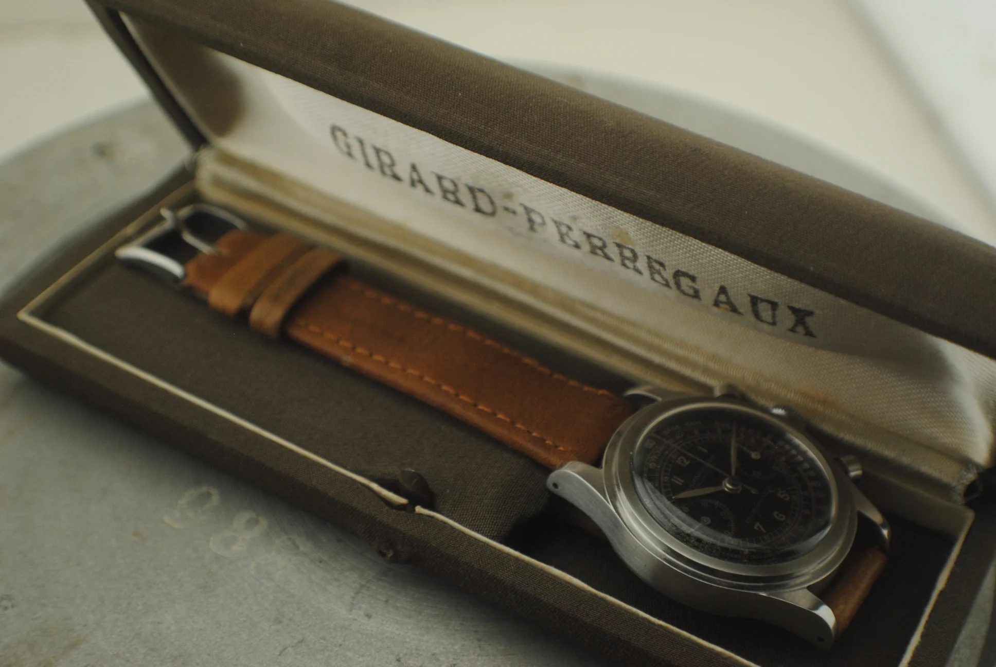 Girard-Perregaux chronograph and brown leather strap inside the signed original presentation box