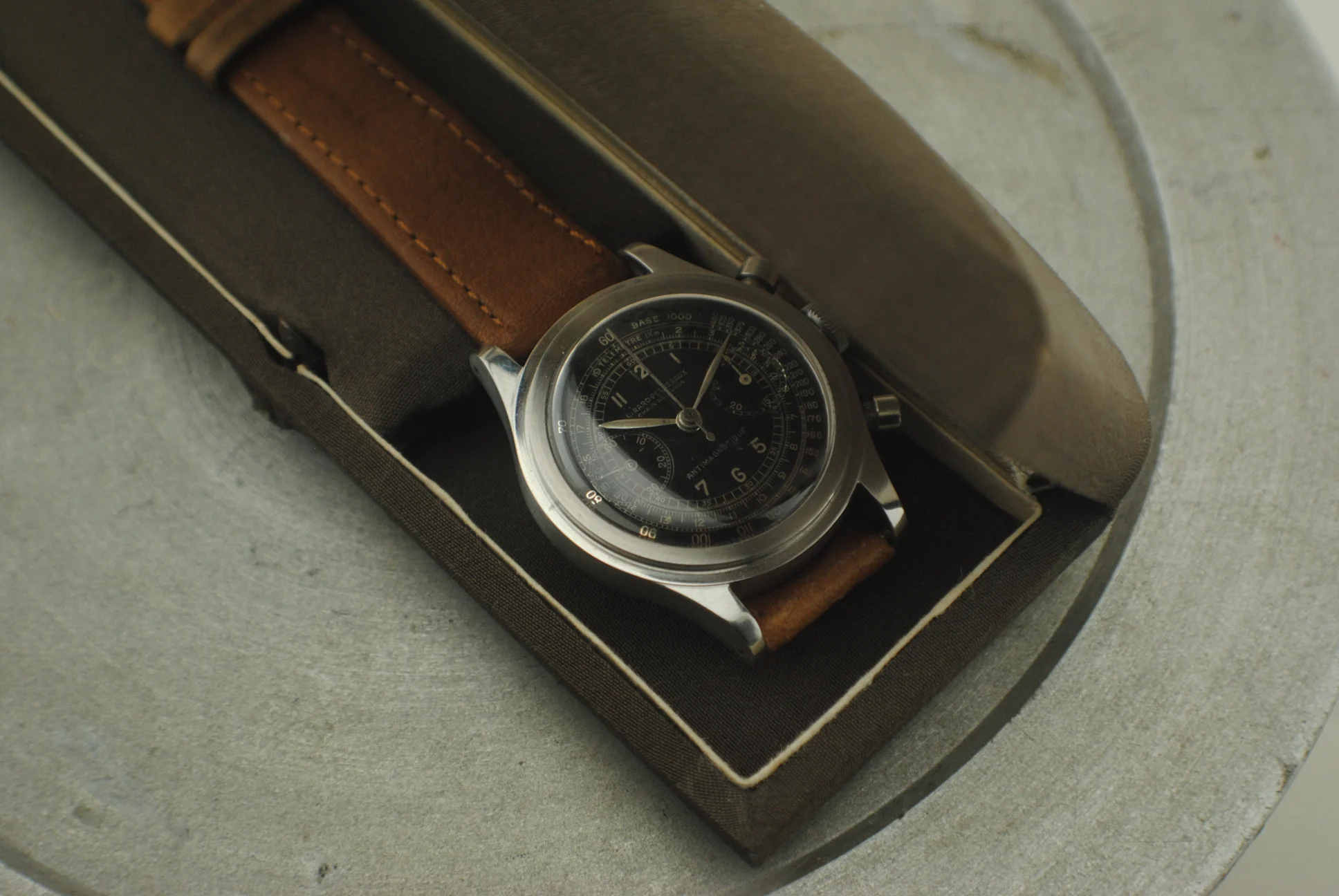 Girard-Perregaux stainless-steel chronograph displayed in its original 1940s presentation box