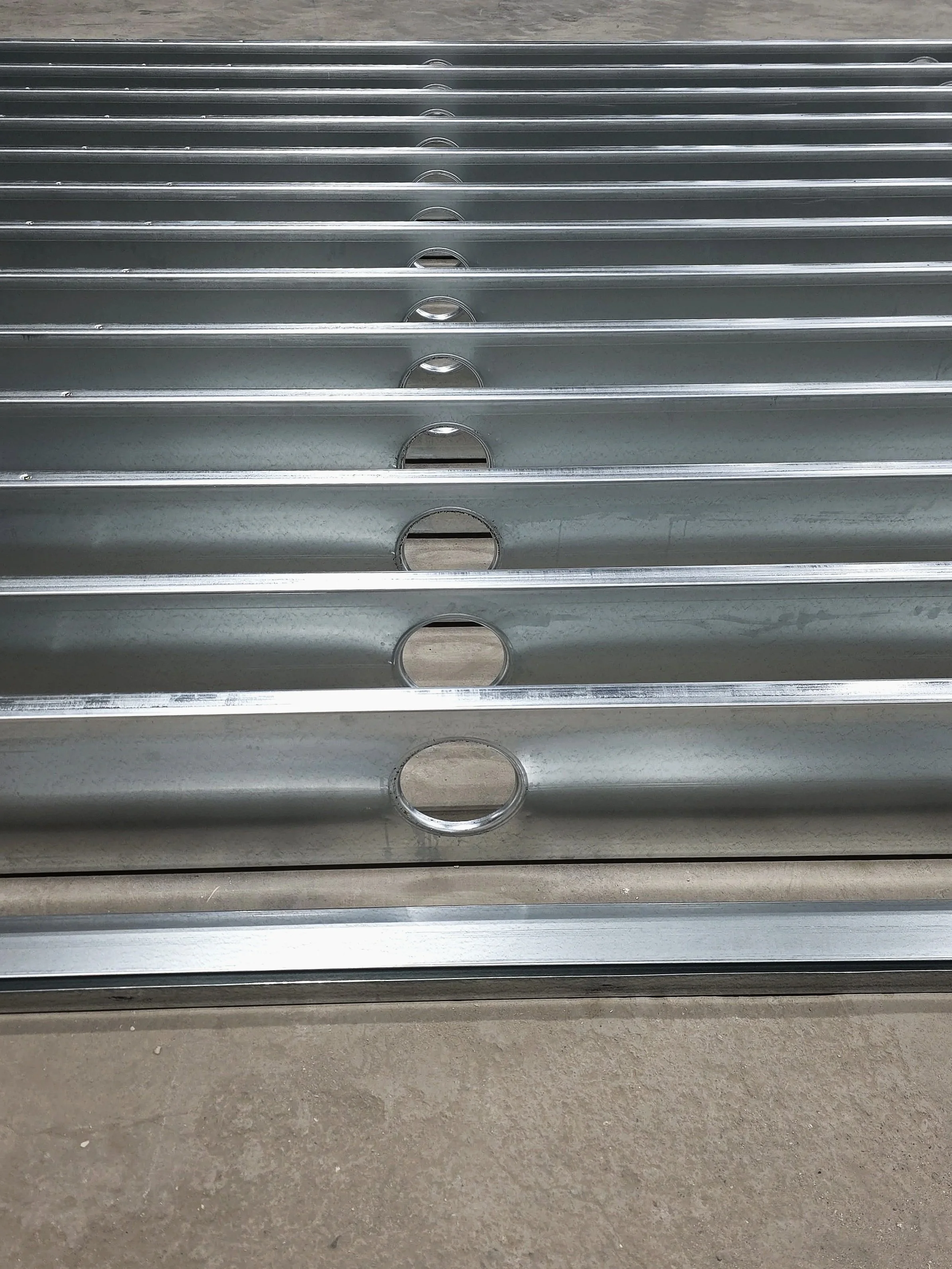 Precision steel studs with utility holes