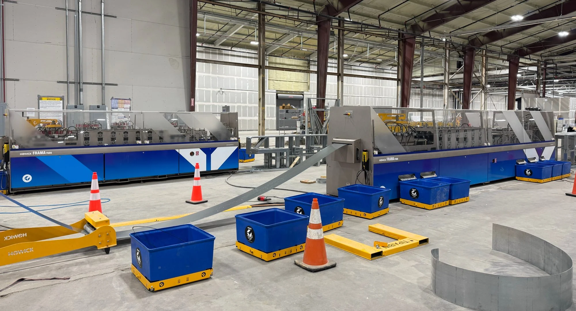 Howick roll-forming lines on the Mytikas factory floor.