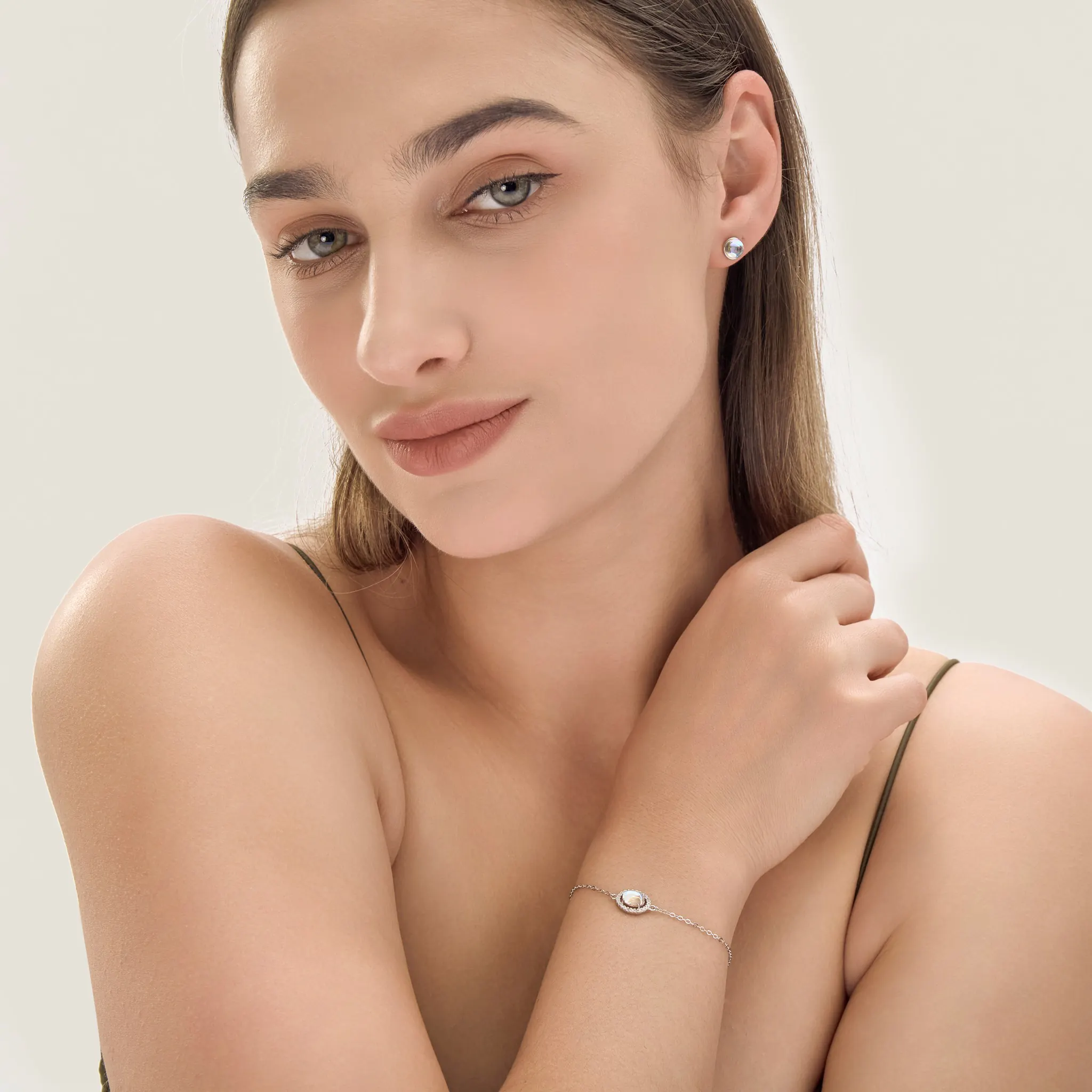 Instagram post with the caption: Moonlights just for you. 🌙\n\nNature Moon stone bracelet and ear...