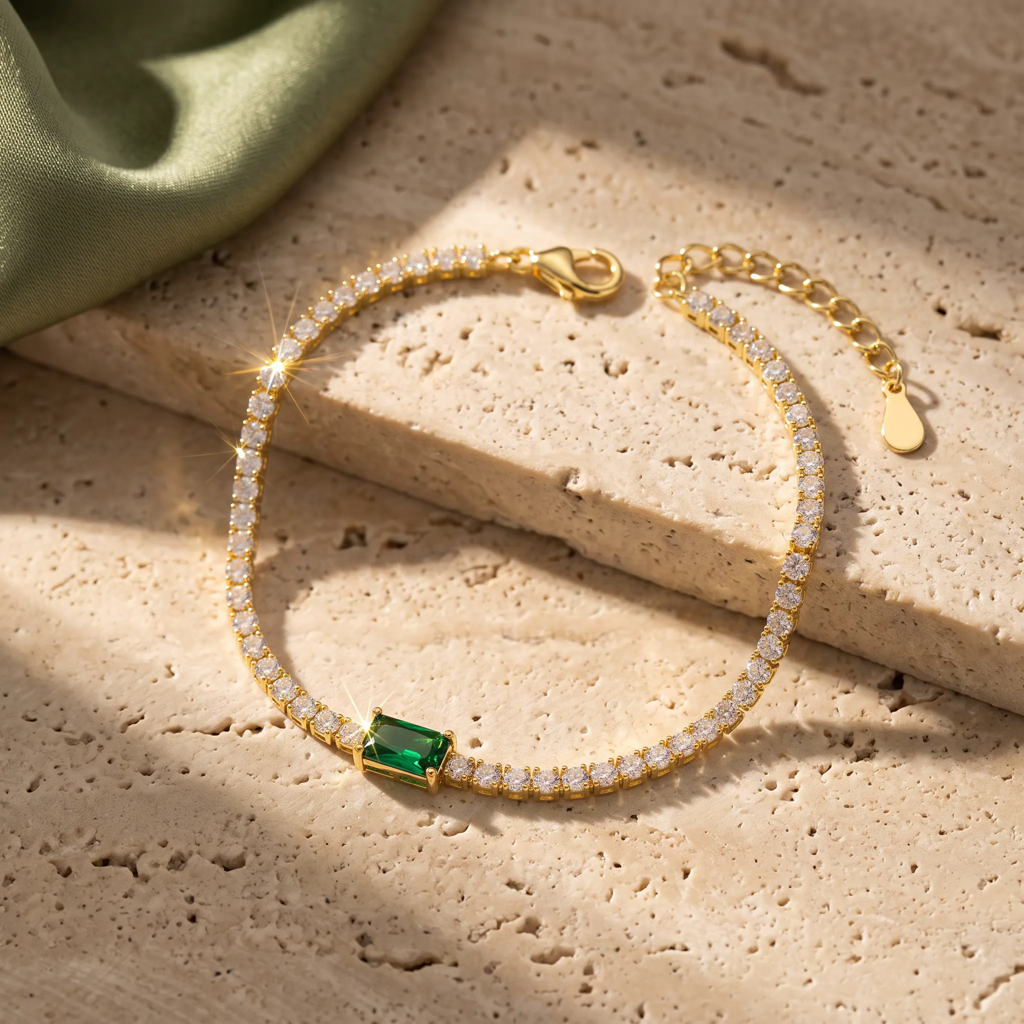 CHOODO VerdantLine gold-plated 925 silver green zircon bracelet on warm travertine