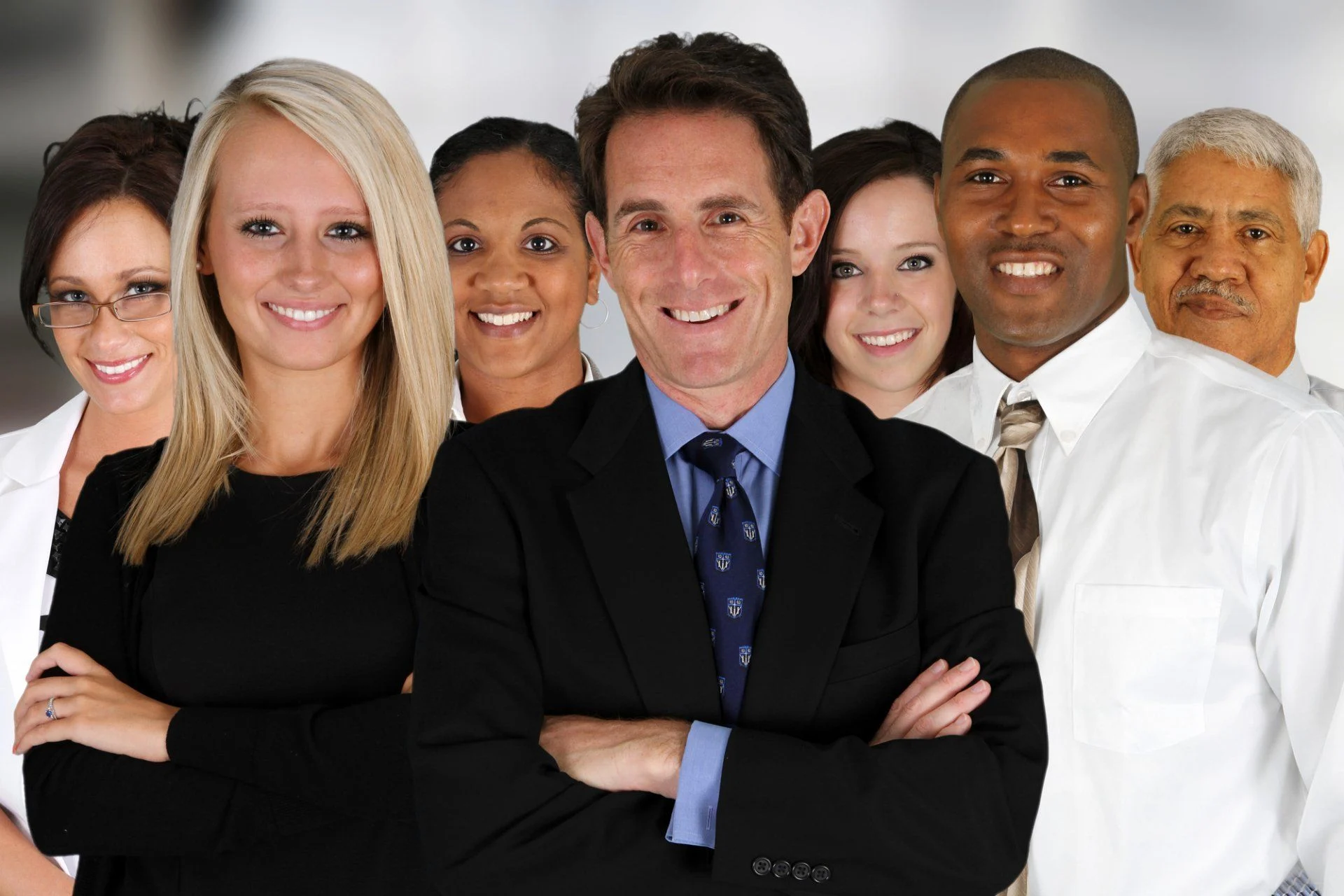 A diverse group of business professionals standing together
