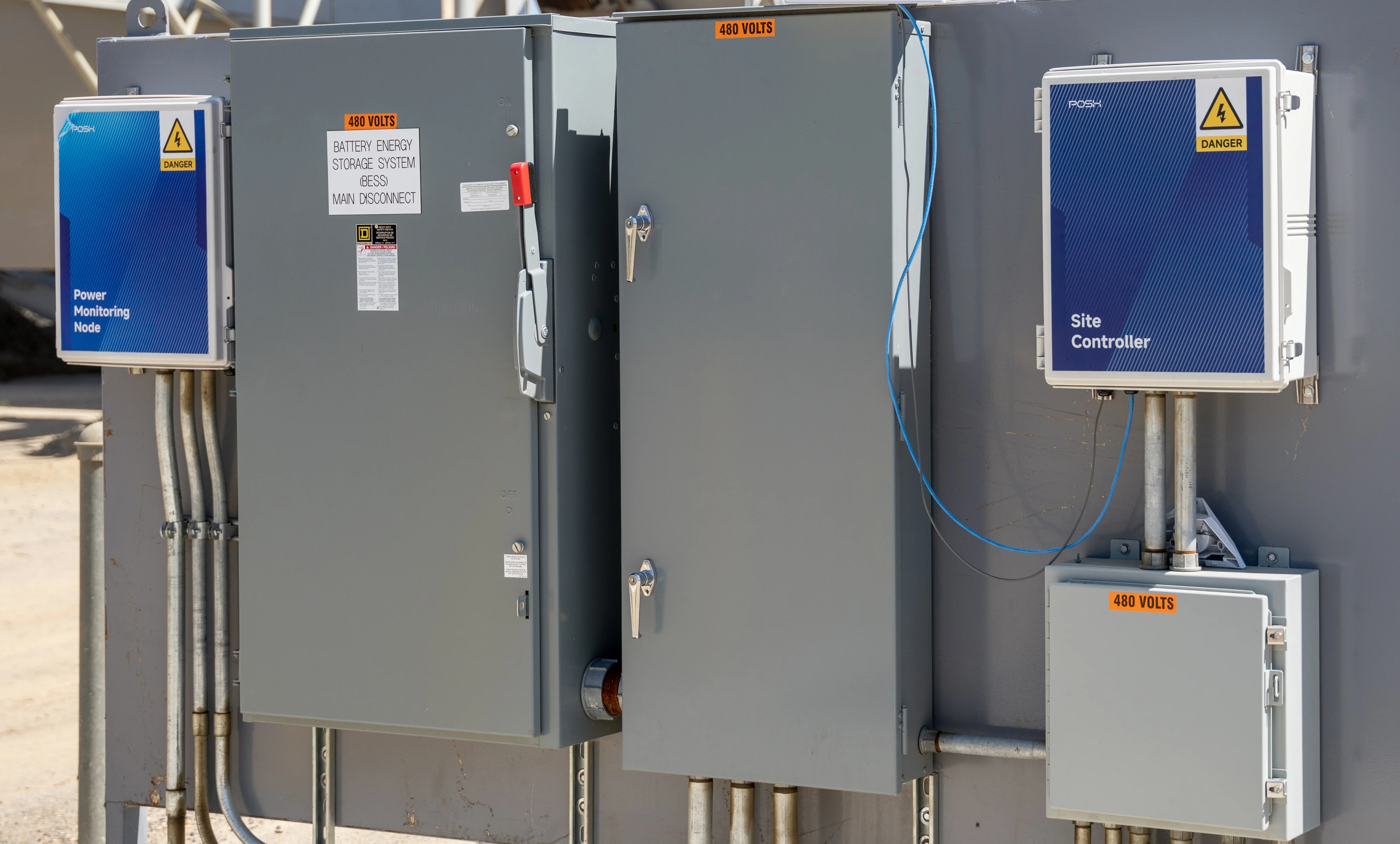 POSH Power Monitoring Node and Site Controller enclosures mounted beside the battery energy storage system main disconnect at Teichert.