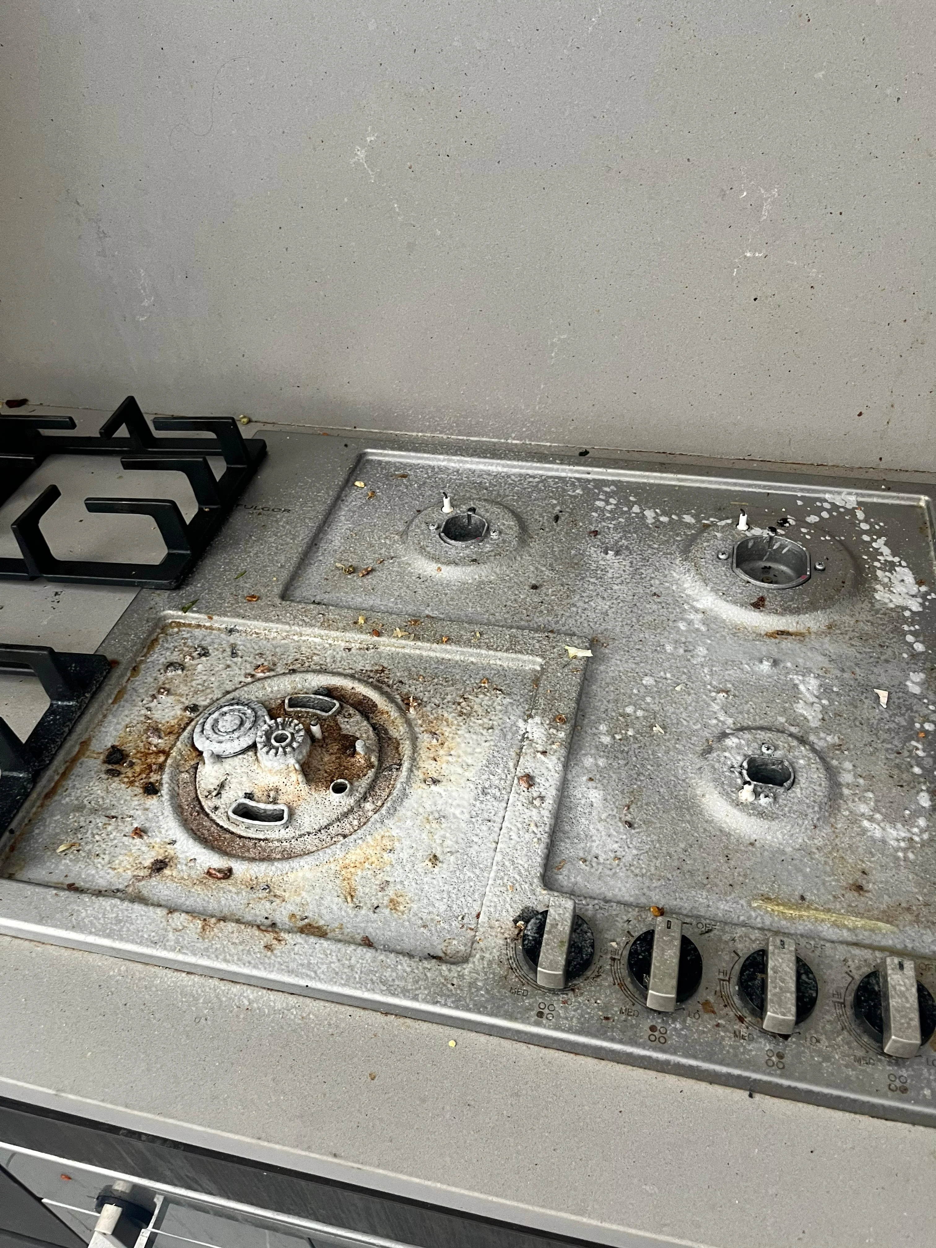 Image of stove before cleaning