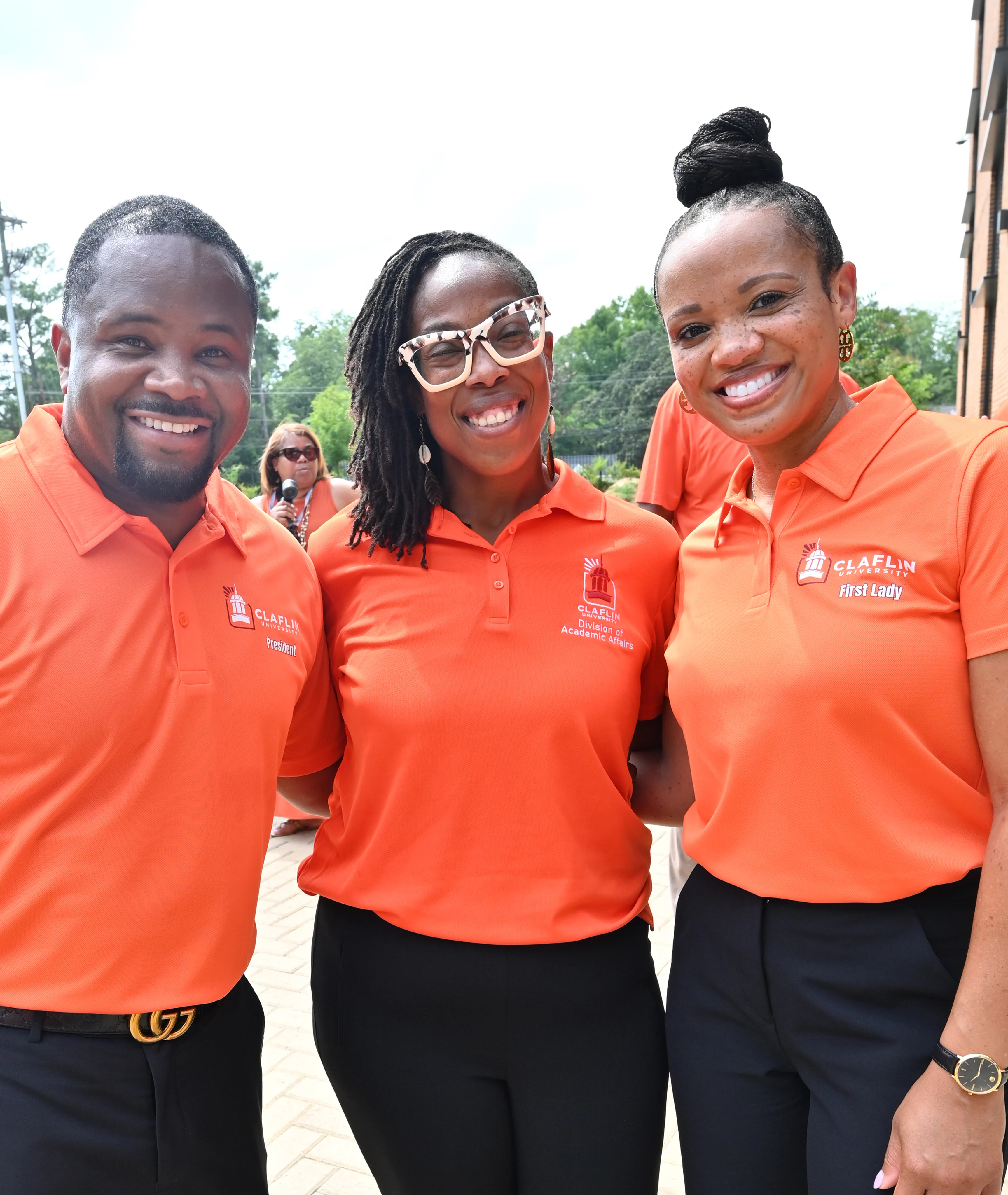 Claflin University leaders smiling together during a campus welcome event