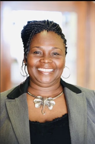 Ms. Andrea Grant