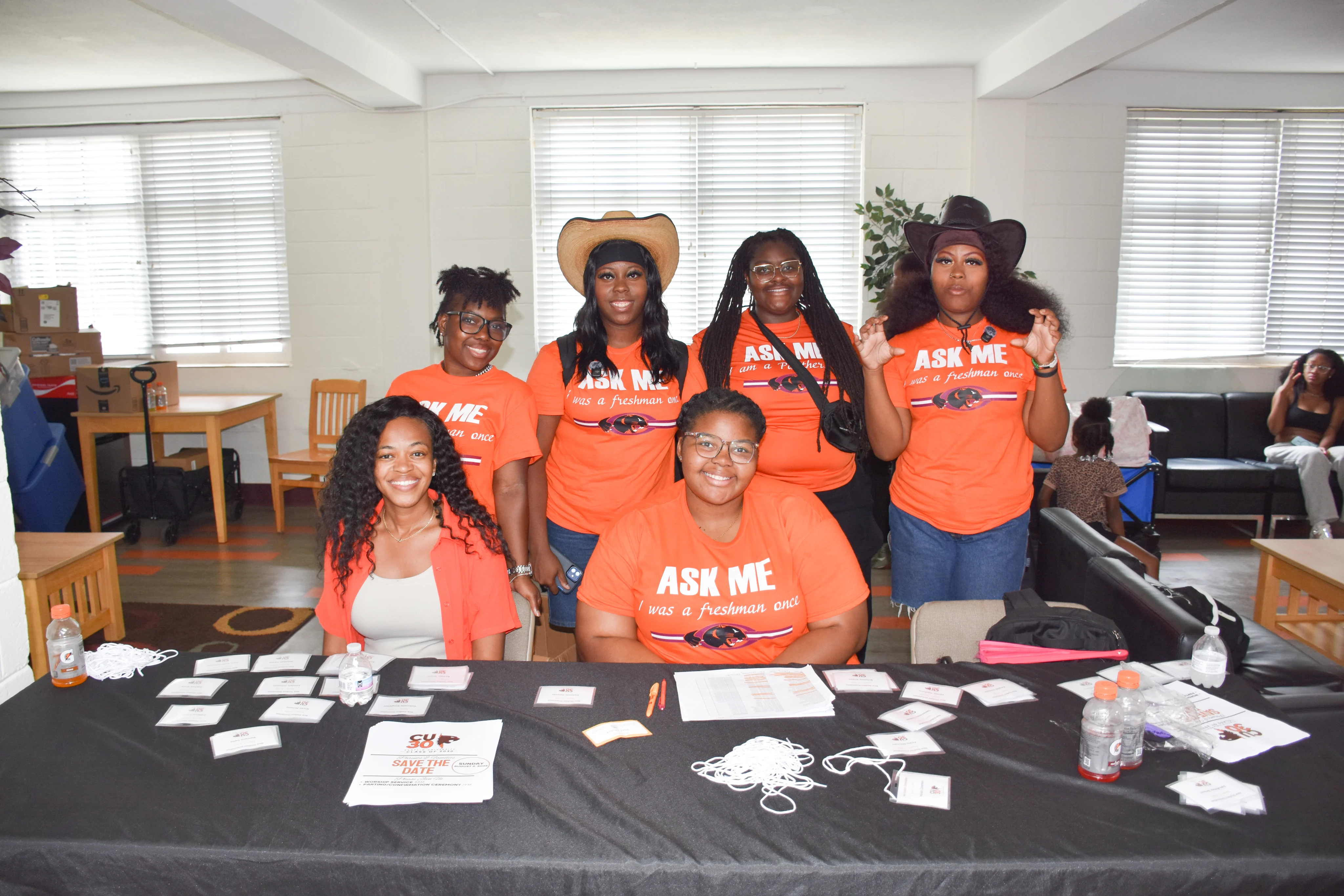 Claflin student ambassadors welcoming new students at a campus event