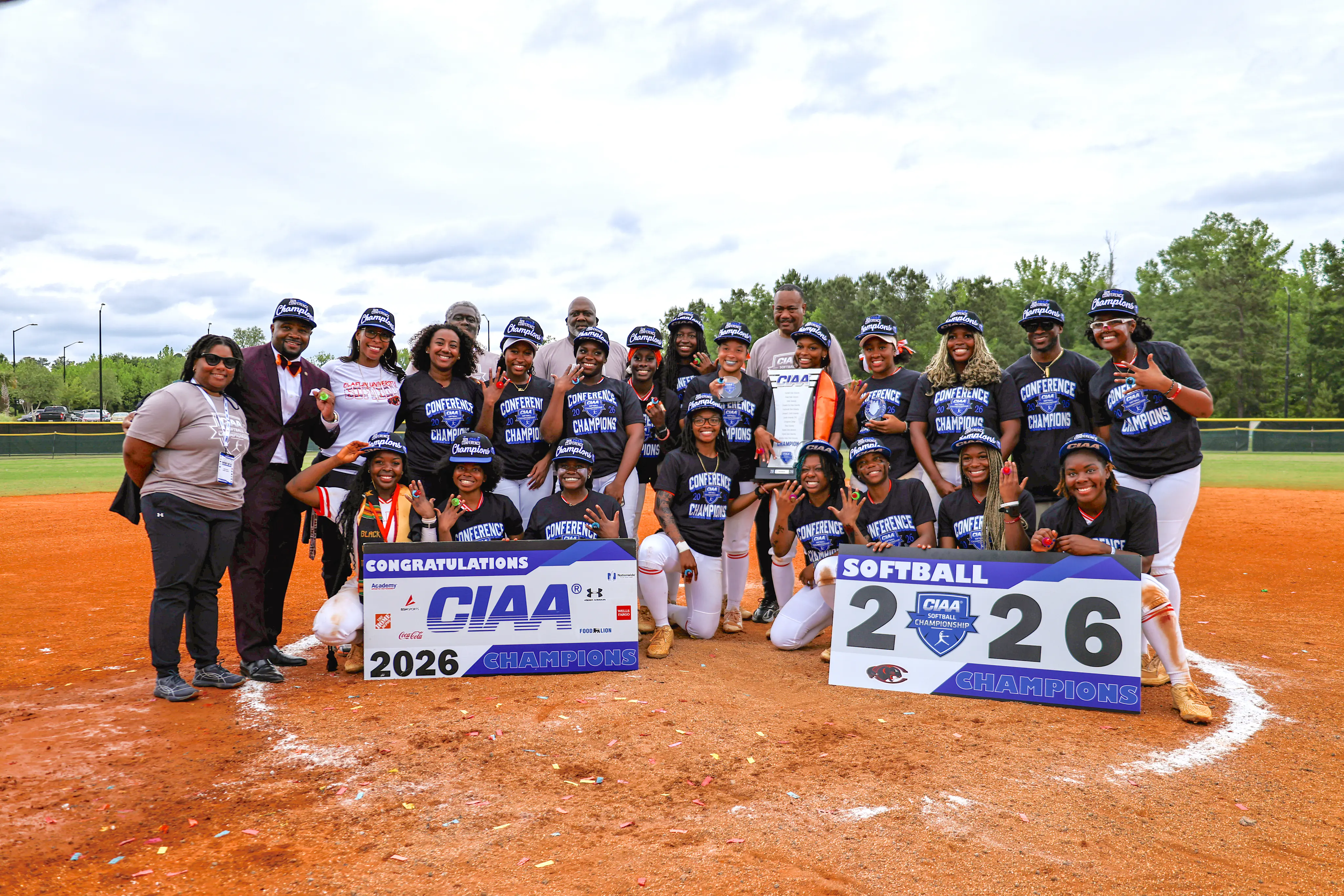 Claflin softball players and coaches celebrating the 2026 CIAA championship