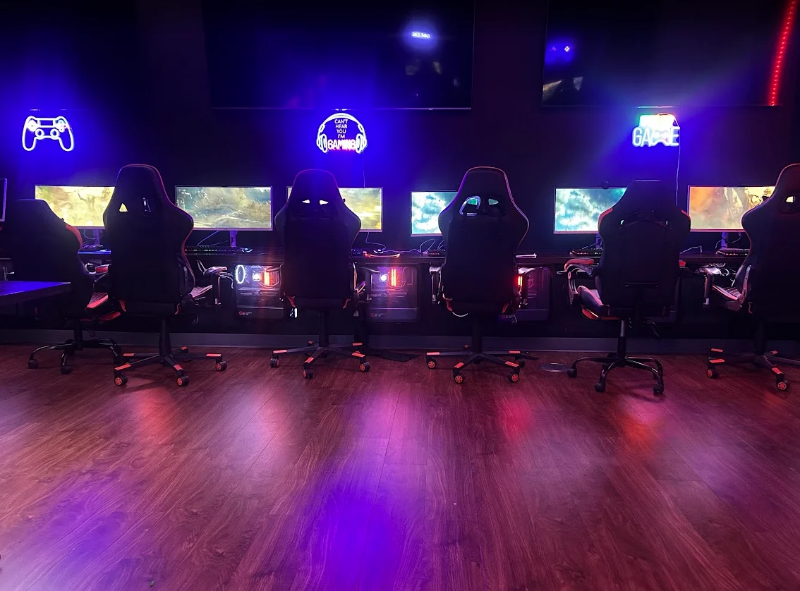 Right side of the Claflin University Esports Lab with gaming stations and purple neon lighting