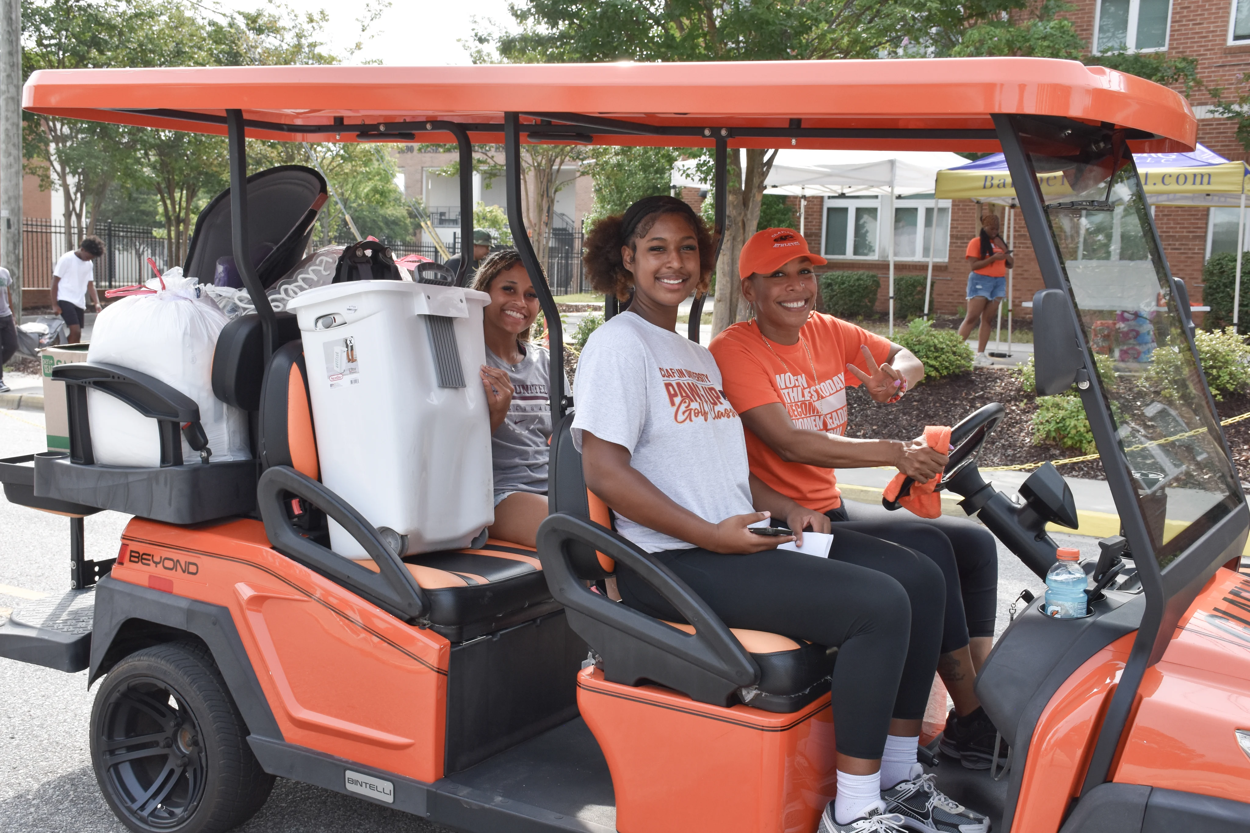Claflin students helping one another move into campus housing