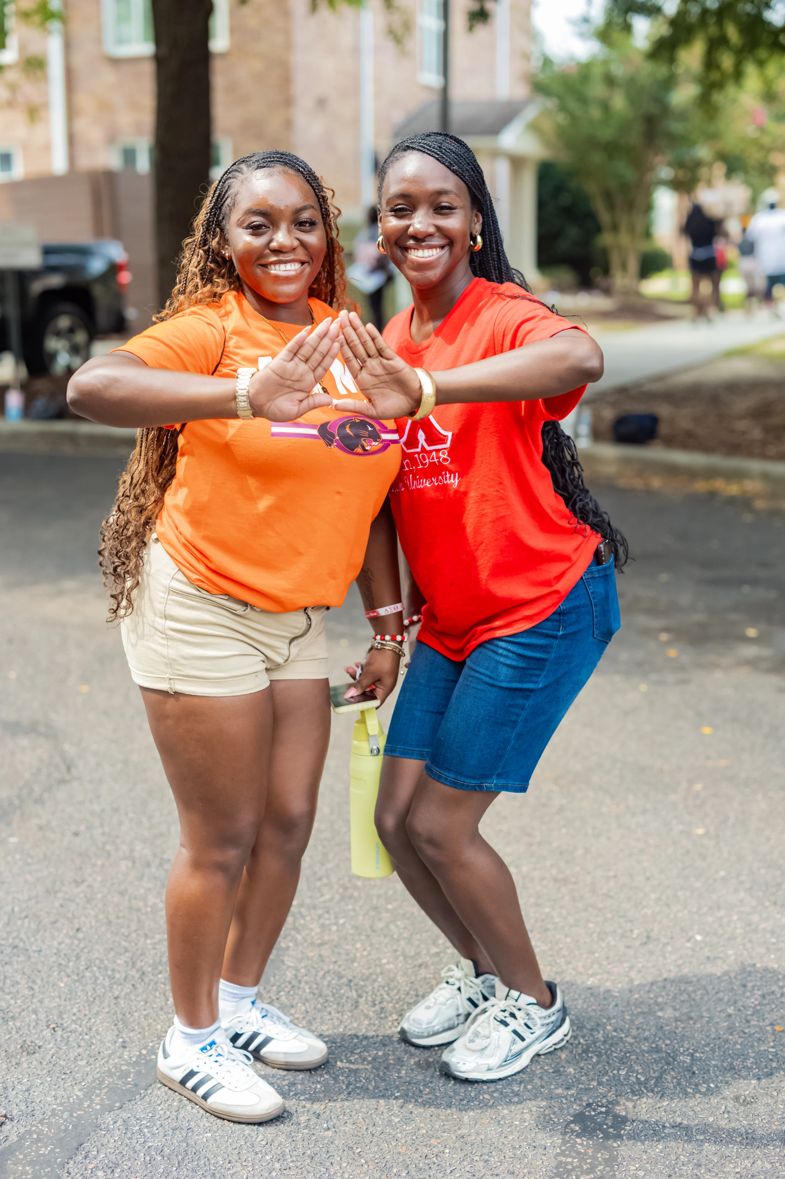 Two Claflin students smiling together on move-in day