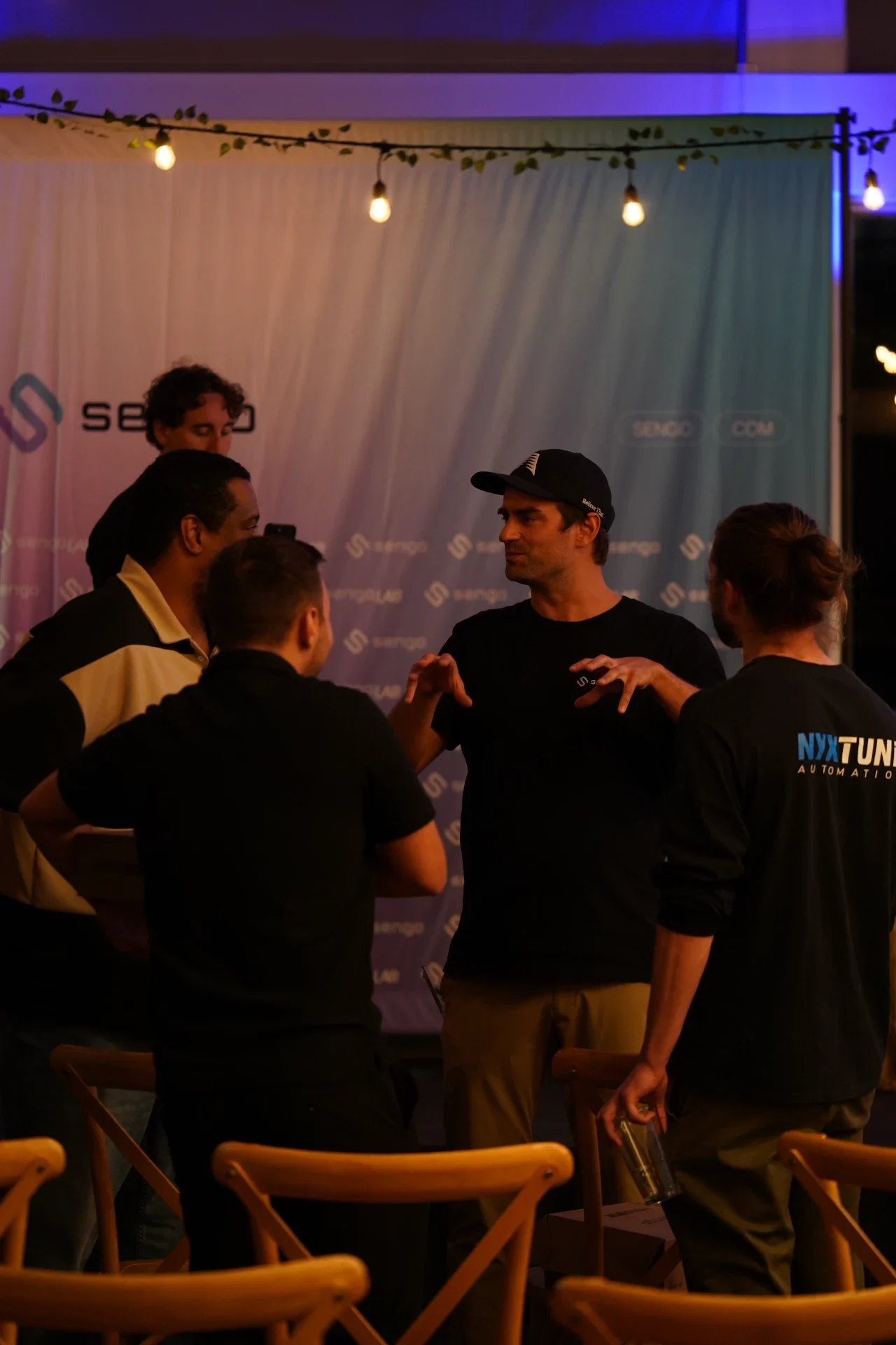 Jean-Nicolas Gauthier talking with attendees