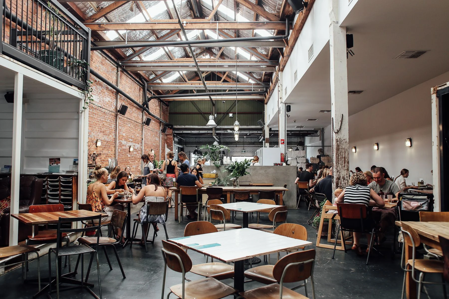 A busy restaurant dining room with guests